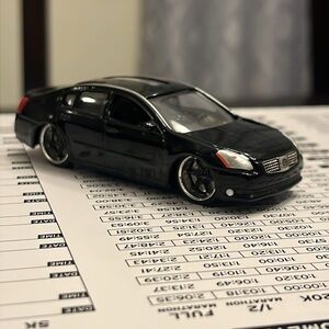 Jada Nissan Maxima 2006 Toy Car 1/64 black diecast Dub City
